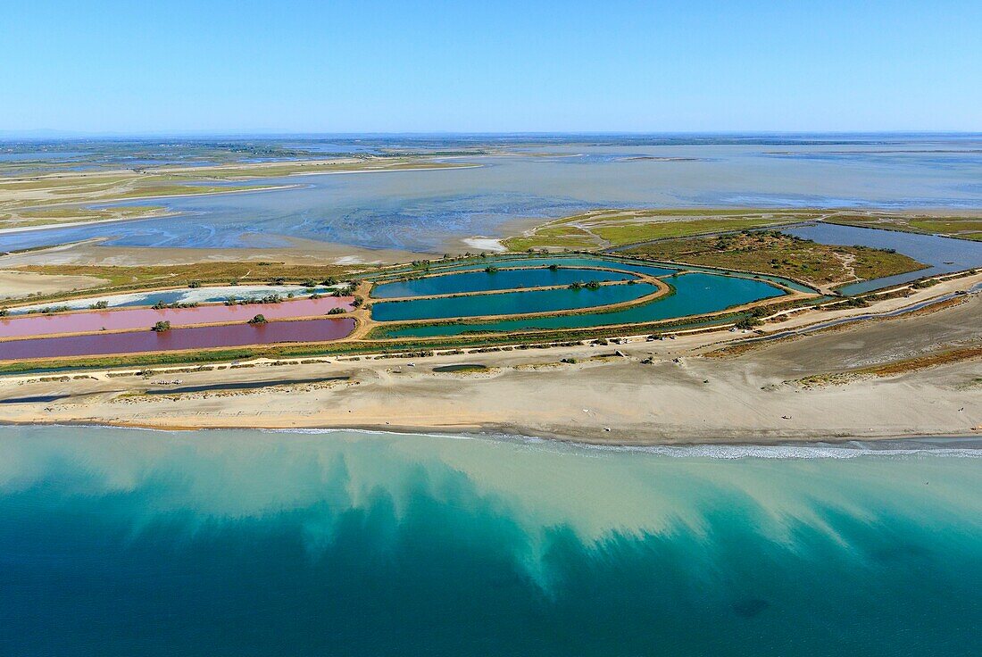 France, Bouches du Rhone, Camargue Regional Natural Park, Saintes Maries de la Mer, Raft Drop, Decantation Pool, Pointe de Jean Place and Imperial Pond in the background (aerial view)