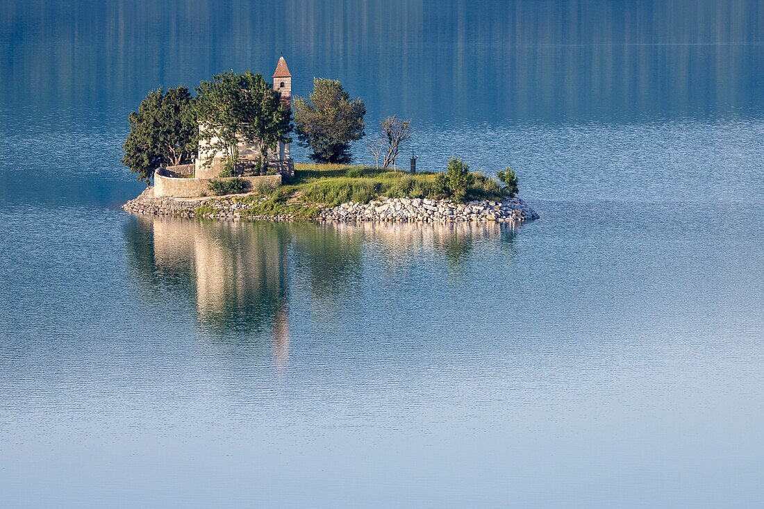 France, Hautes Alpes, the lake of Serre Poncon, Saint Michel chapel of the 12th century on Saint Michel islet