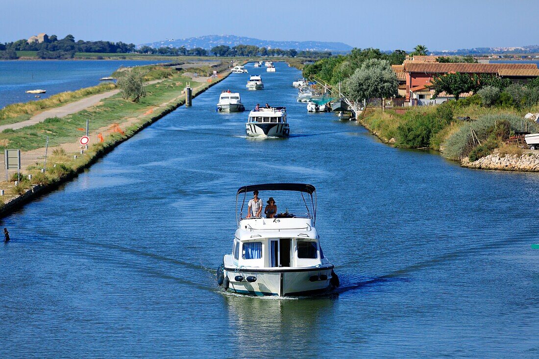 France, Herault, Palavas les Flots, Les Quatre Canaux area, Canal du Rhone in Sete, Boat rental The Boat