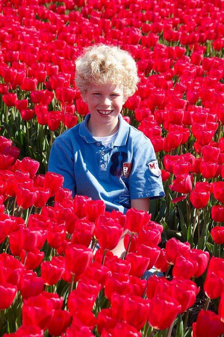 Boy in flower field