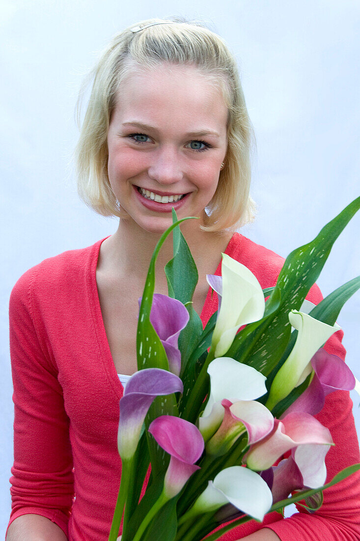 Girl holding Zantedeschia