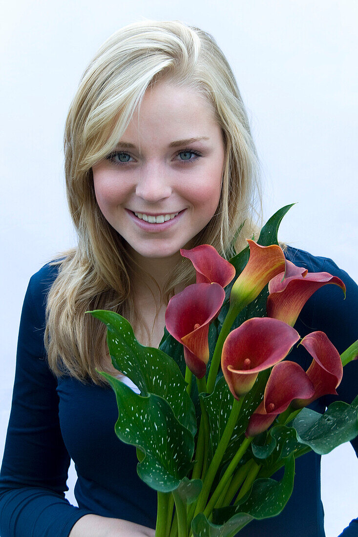 Girl holding Zantedeschia