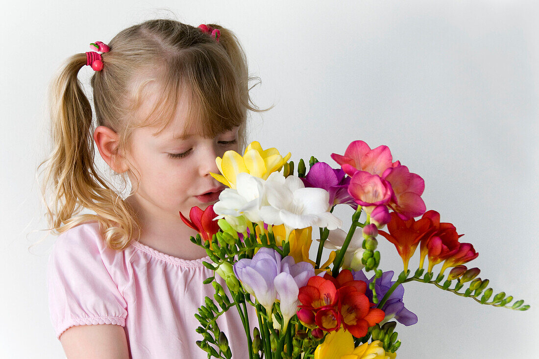 Girl holding Freesia