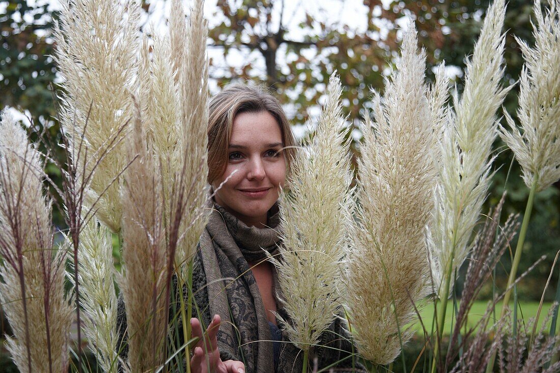 Woman holding Cortaderia