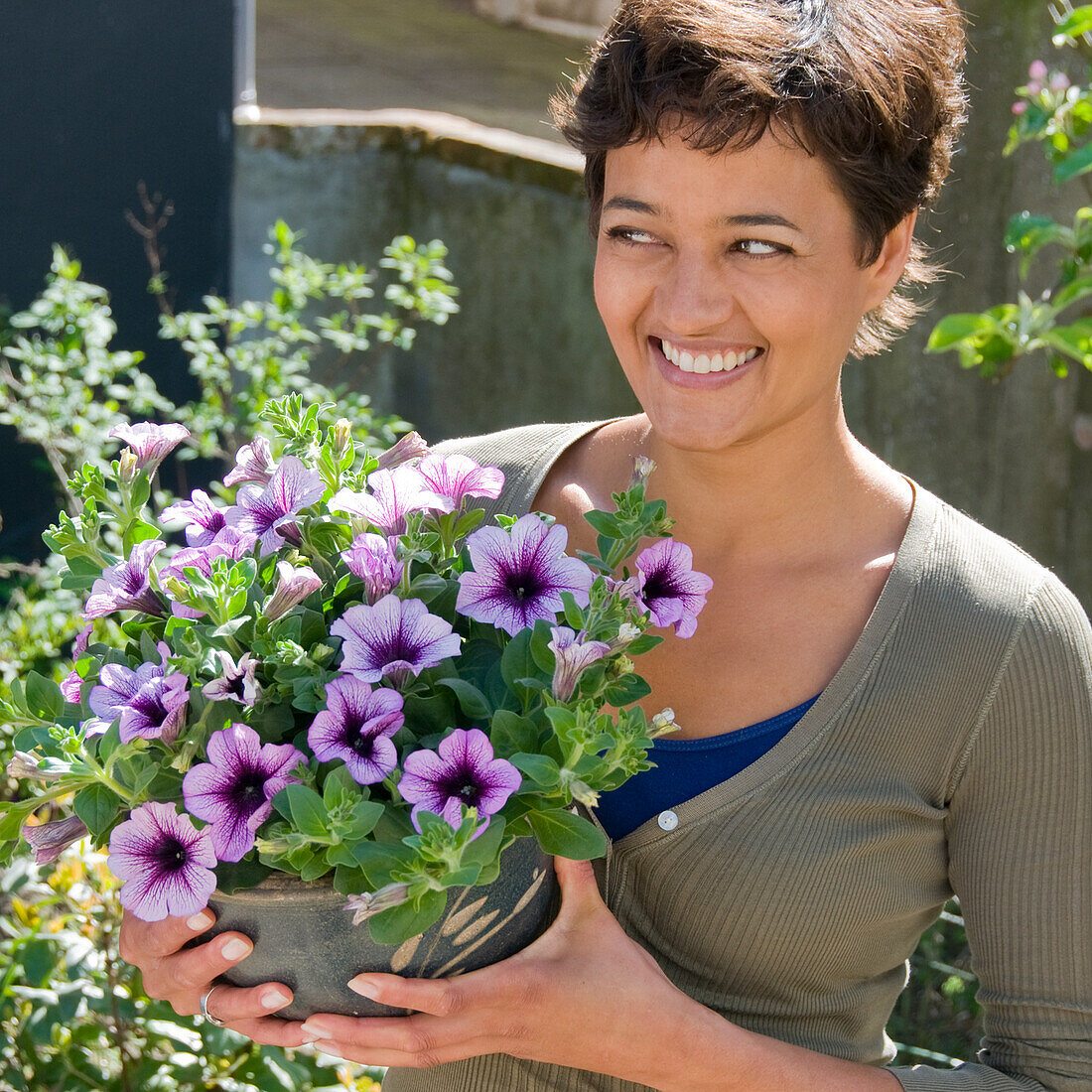 Woman holding Petunia