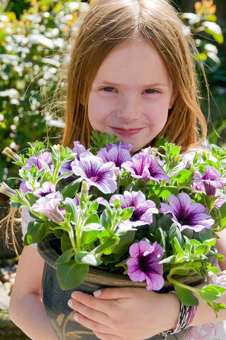 Girl holding Petunia