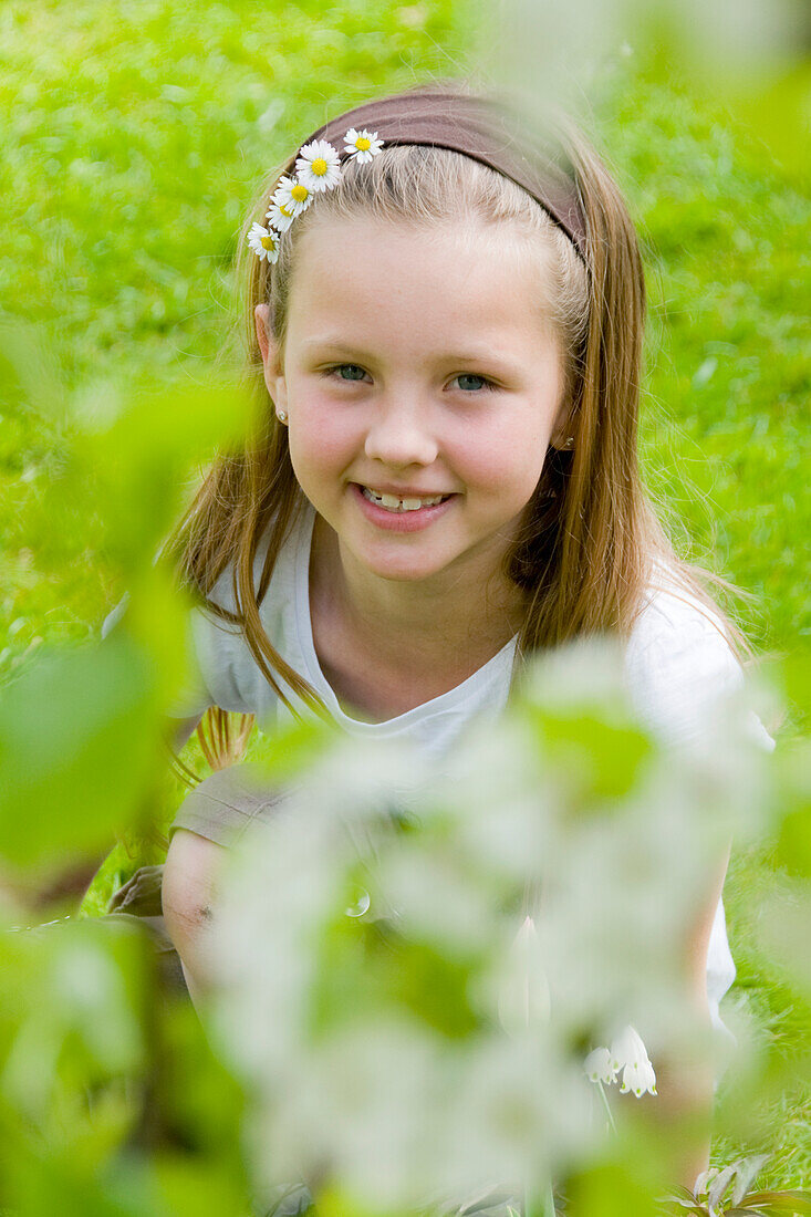 Girl with daisies in hair