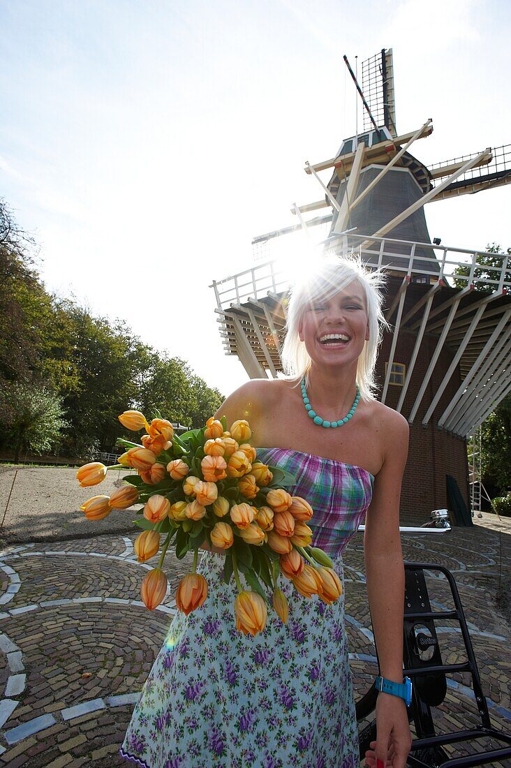 Woman holding tulips