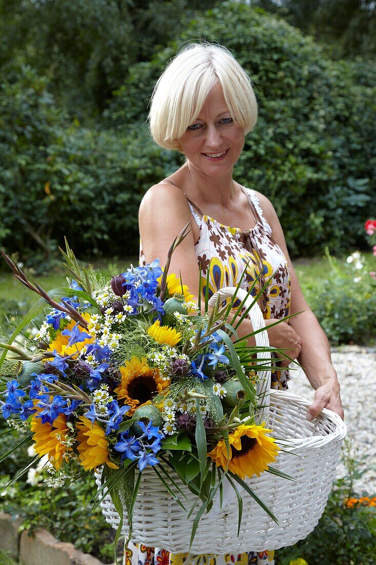 Holding summer bouquet