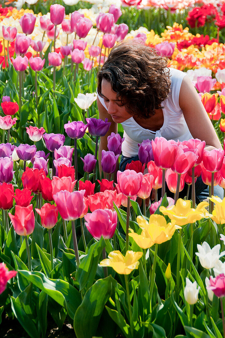 Woman in tulip field