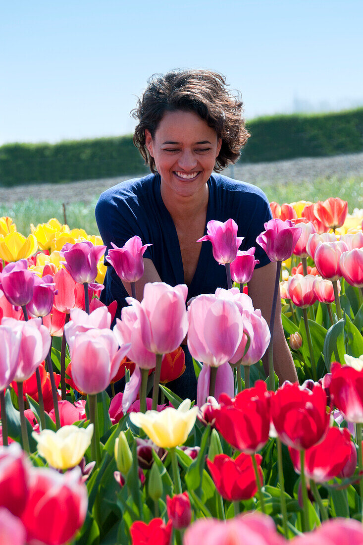 Woman in tulip field