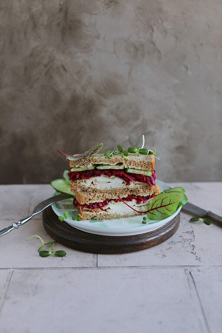 Healthy sandwich with cream cheese, beetroot and cucumber