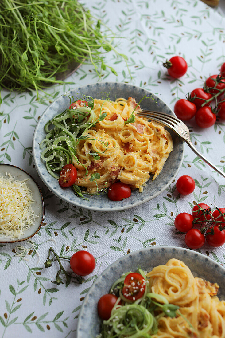 Linguine carbonara with cocktail tomatoes