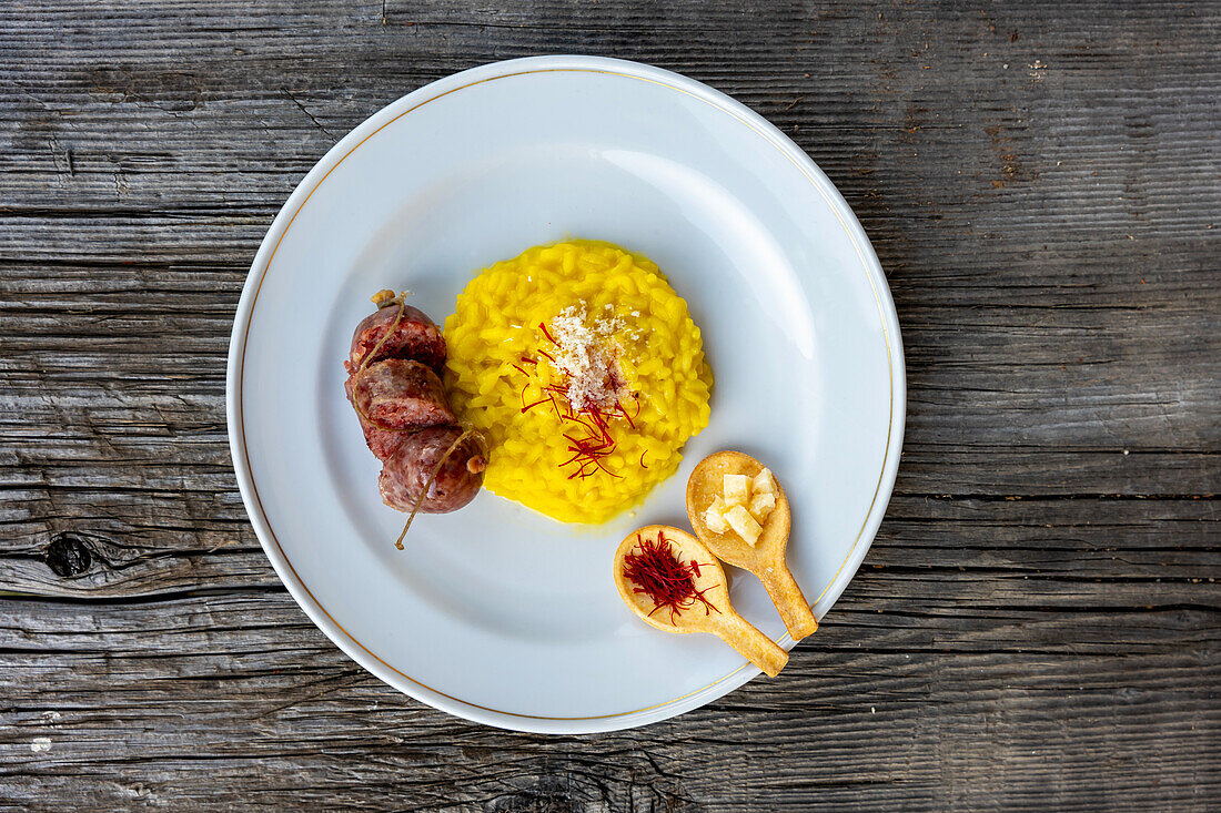 Saffron risotto alla Milanese and Luganighe sausage