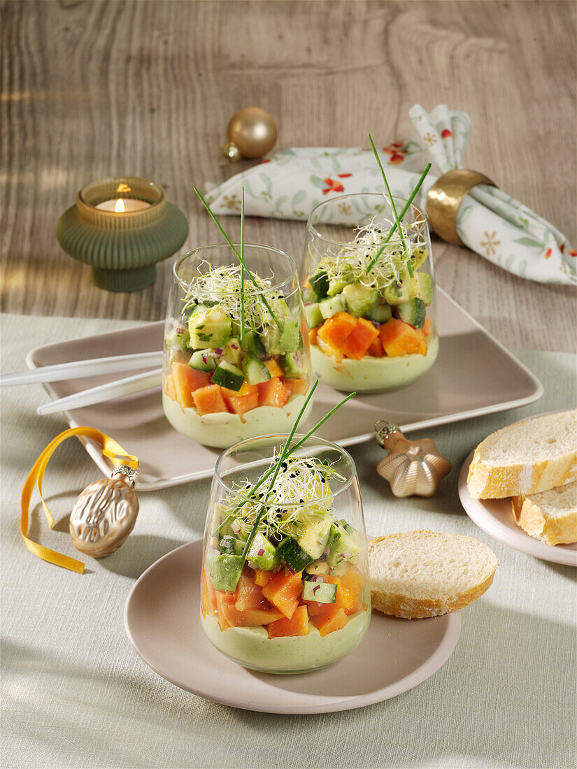 Avocado salad with papaya, cucumber, coriander and alfalfa sprouts