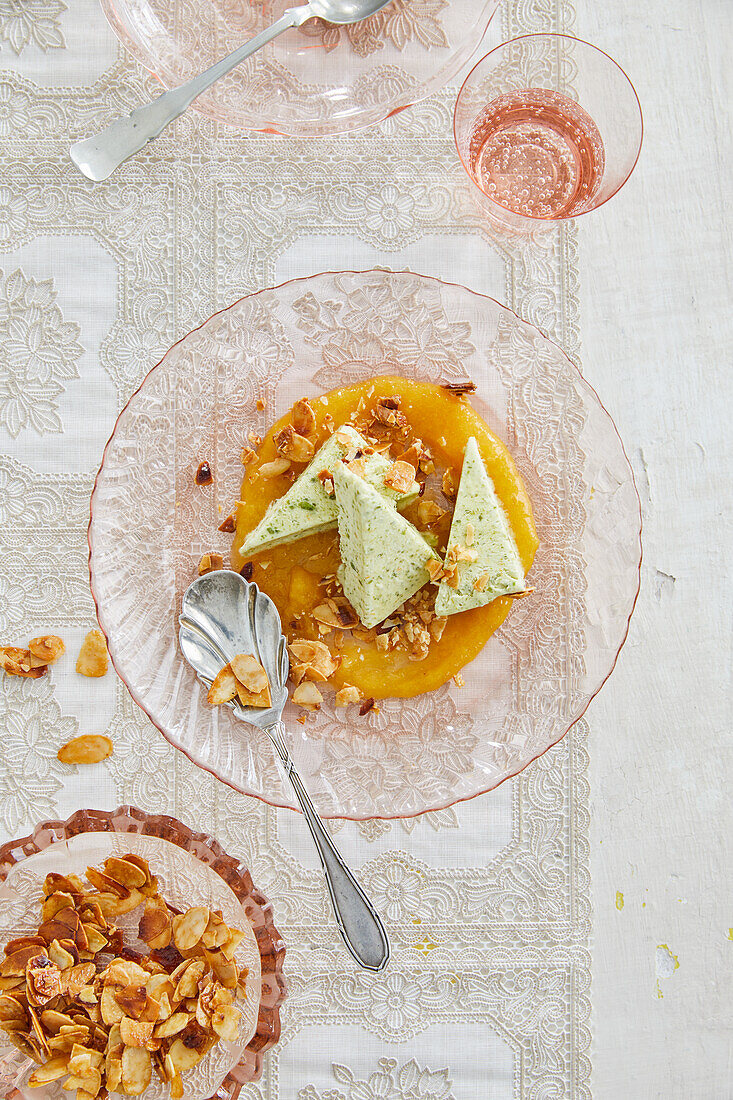 Italian pistachio parfait with apricot sauce and almond brittle