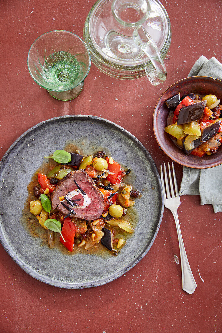 Stuffed fillet of beef on caponata