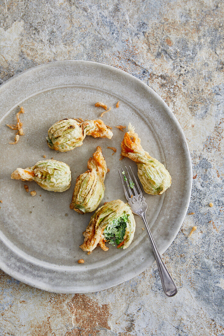 Deep-fried courgette flowers with ricotta and pea filling