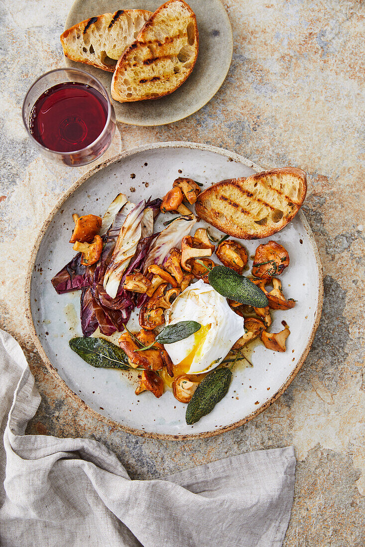 Fried chanterelles and radicchio with poached egg and knob sage