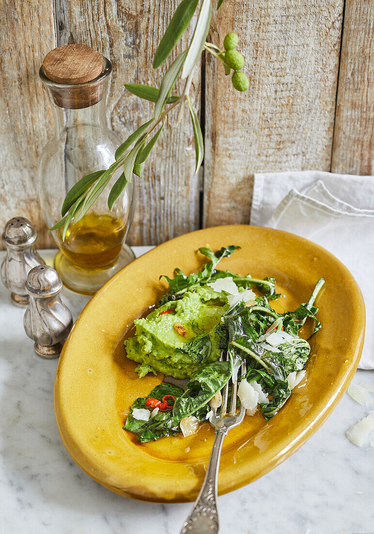 Broad bean puree with steamed dandelions