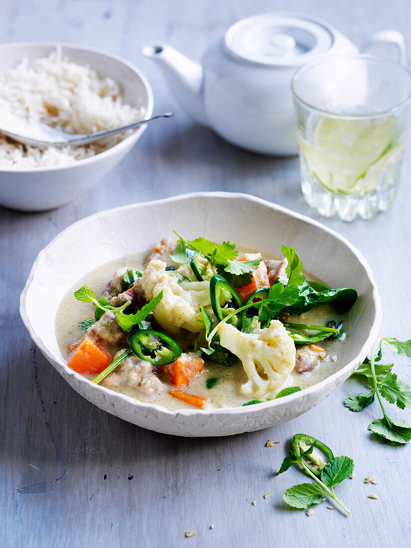 Coconut chicken curry with vegetables and coriander