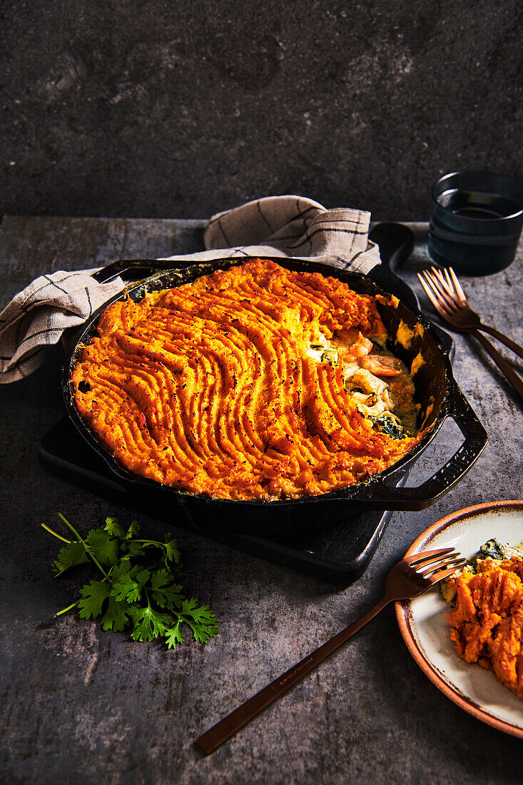 Fish curry casserole with sweet potato topping