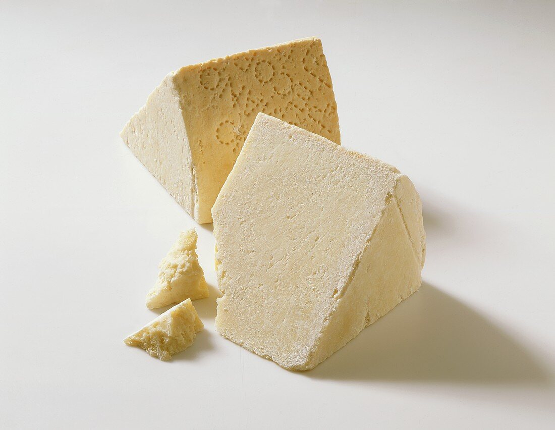 Two pieces of Pecorino Romano Gold (Italian hard cheese)