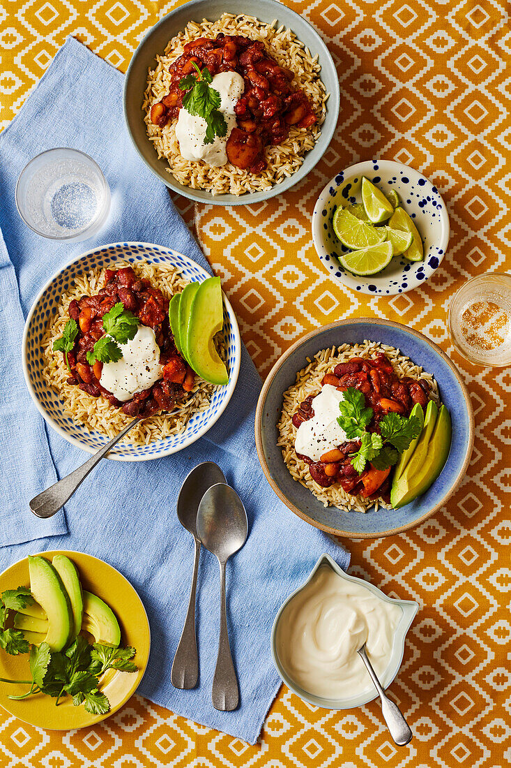 Three-bean chilli with rice and avocado