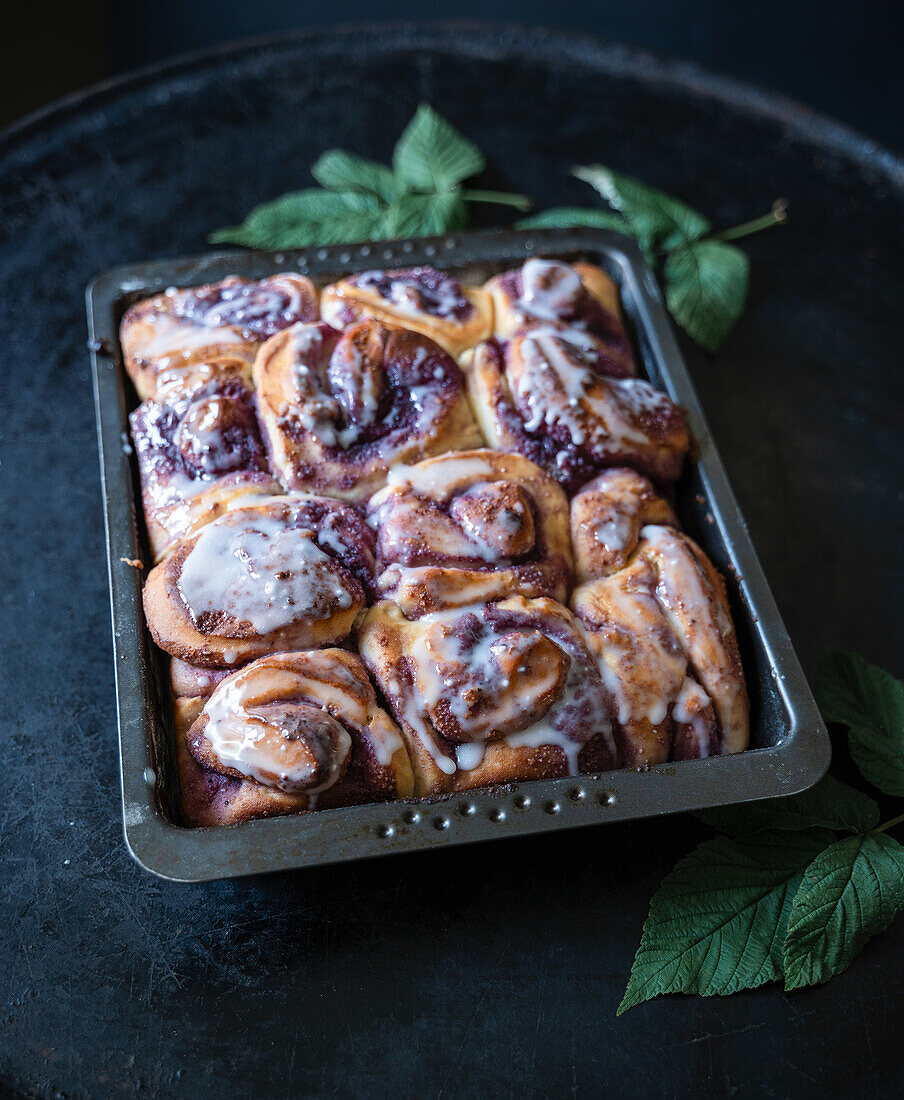 Vegan blackberry yeast buns with icing