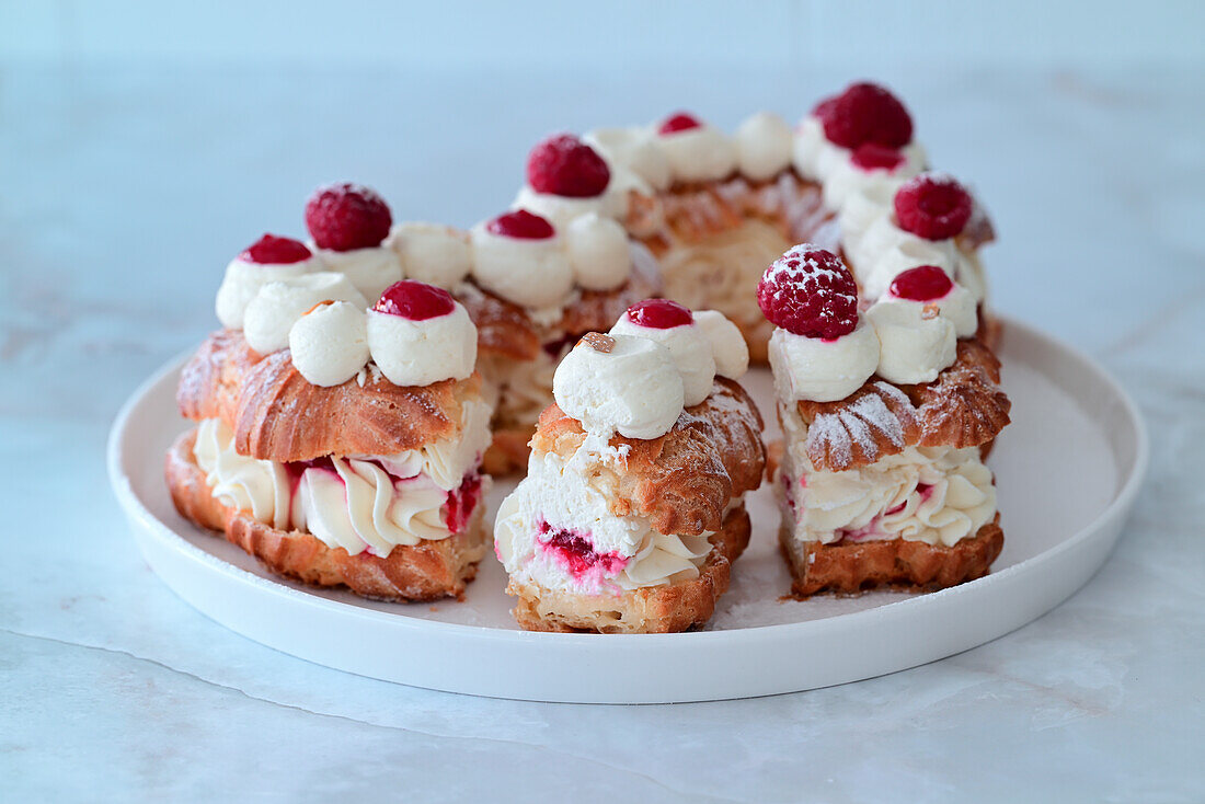 Choux pastry heart with vanilla white chocolate cream cheese and raspberry confit