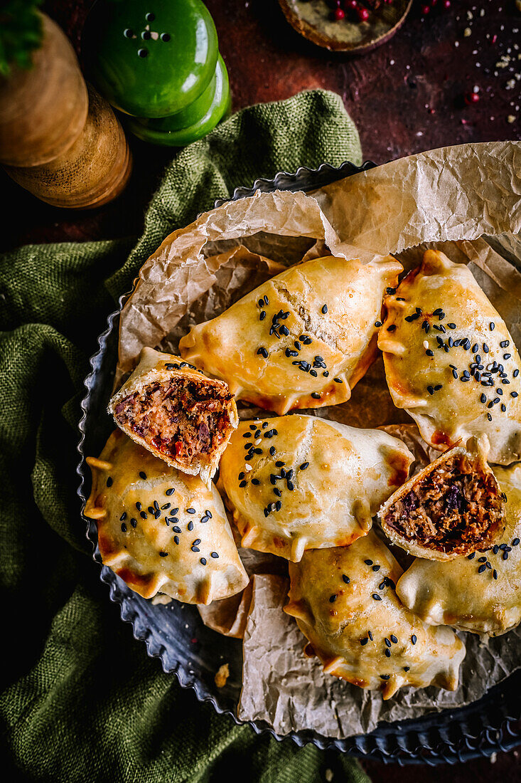 Empanadas with red beans, tuna and tomatoes