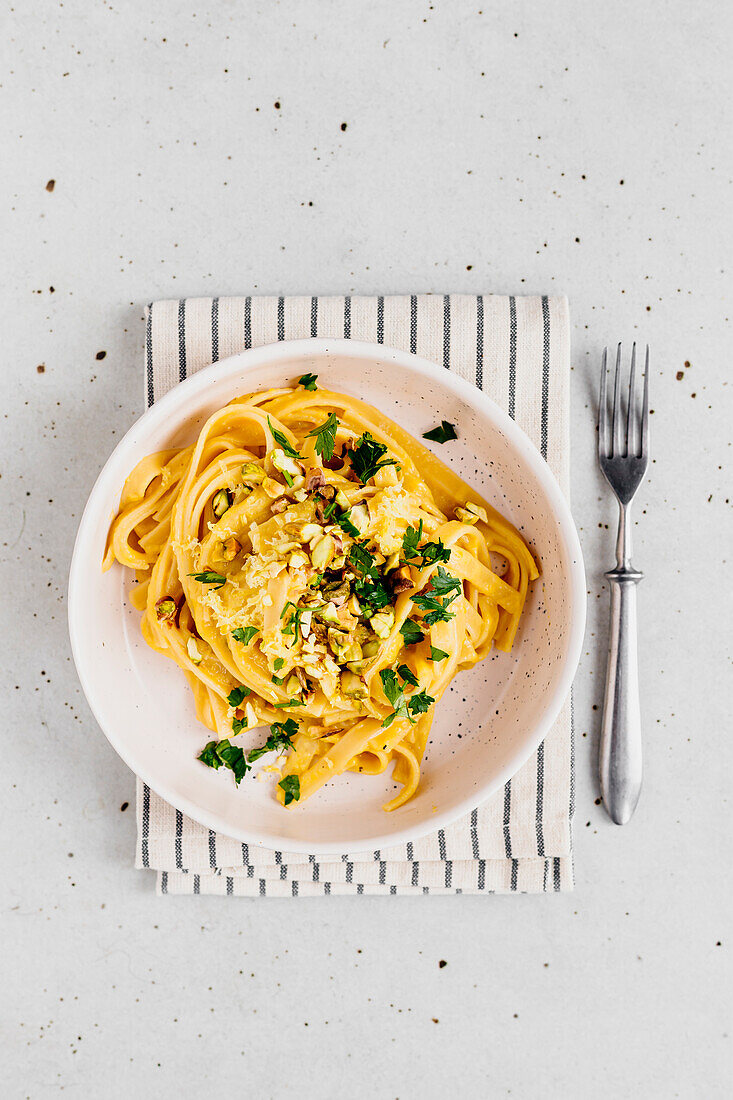 Tagliatelle with yellow roasted pepper sauce