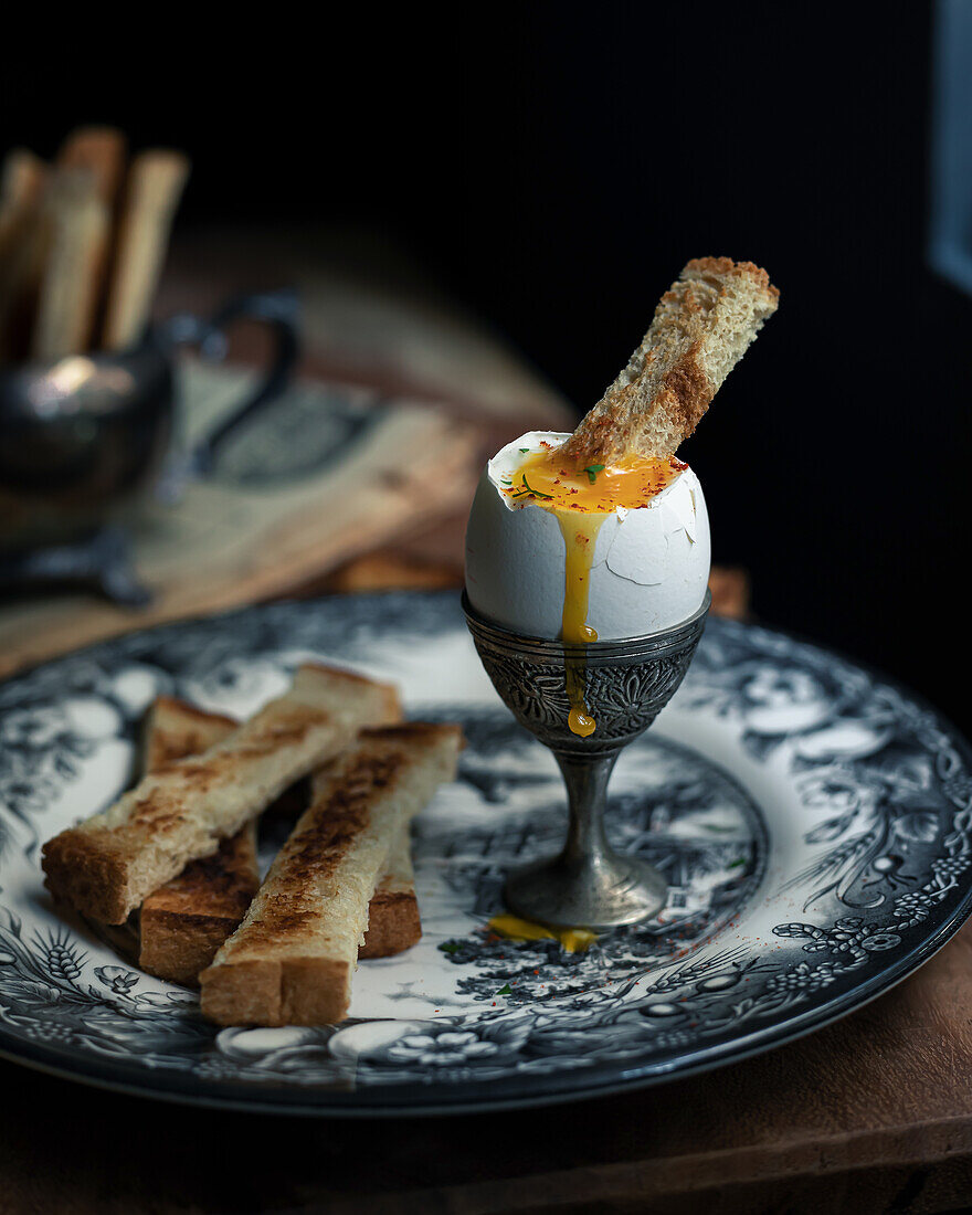 Soft-boiled eggs with toast strips for dipping