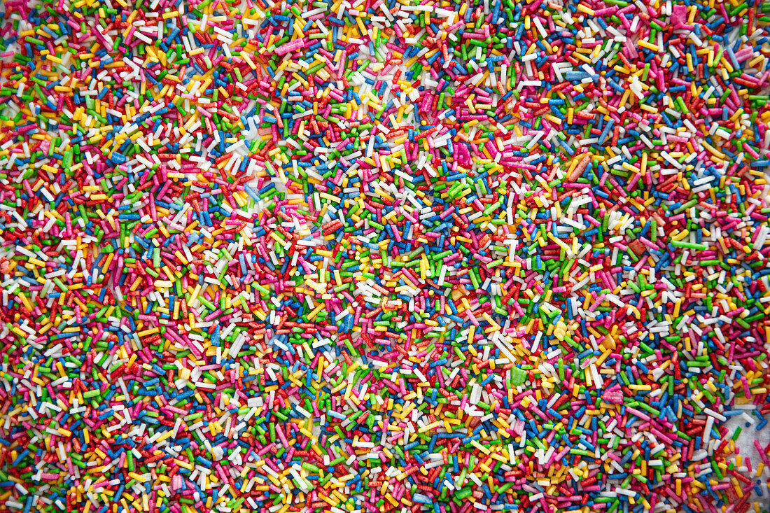 Surface of coloured sugar sprinkles
