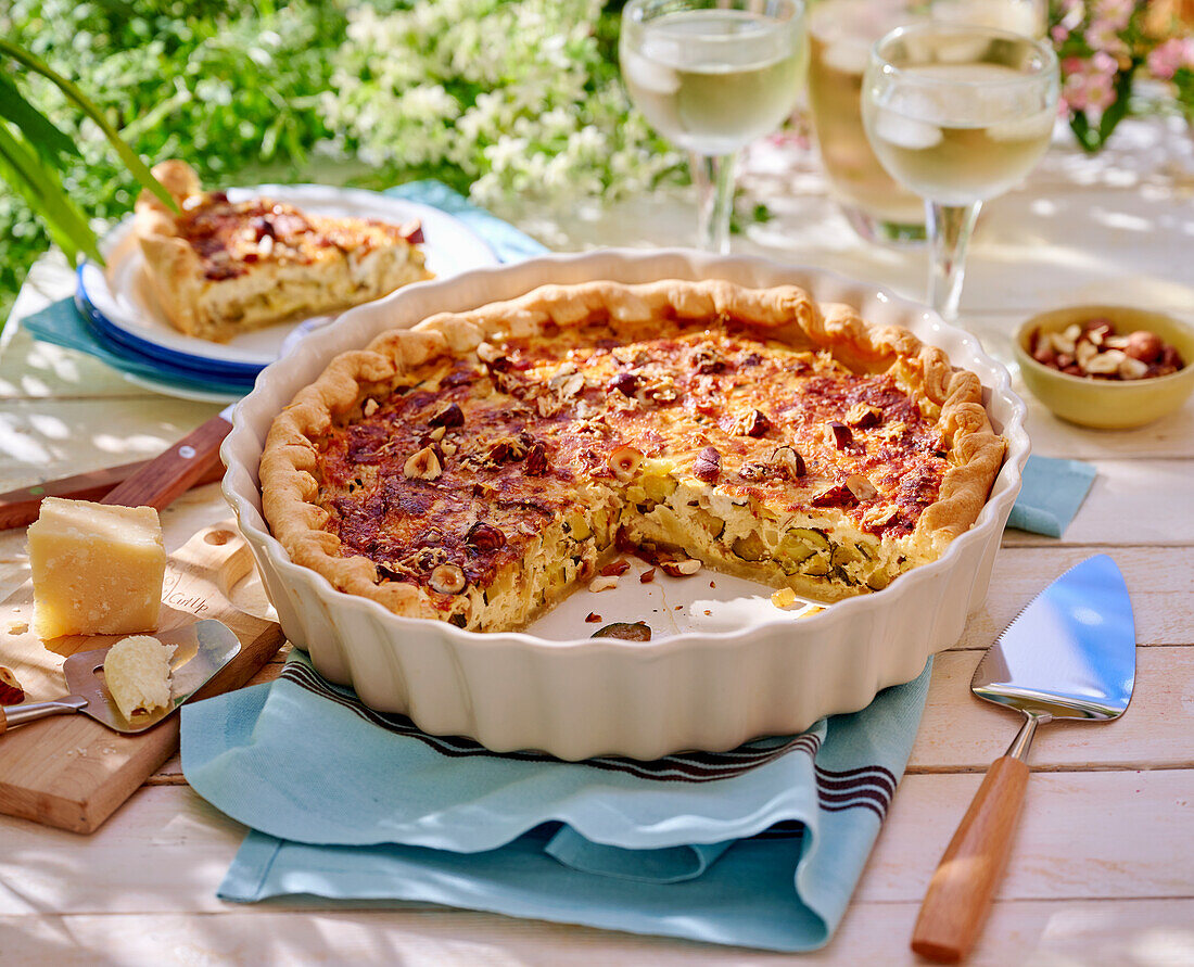 Tart with feta cheese, courgette and hazelnuts