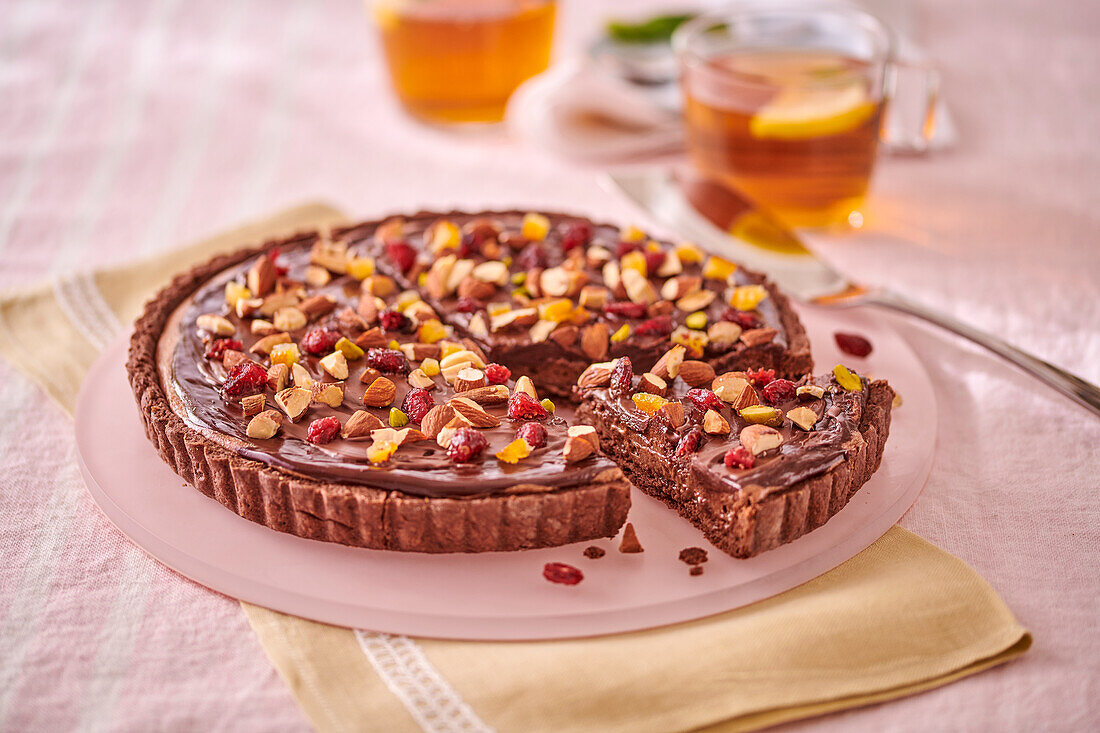 Chocolate tart with seeds and dried fruit