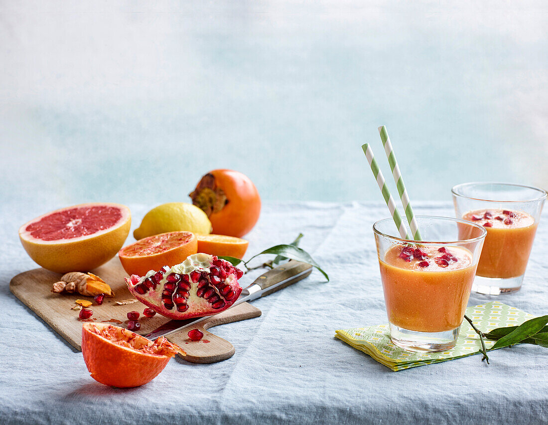 Vitamin smoothie with grapefruit, persimmon and pomegranate