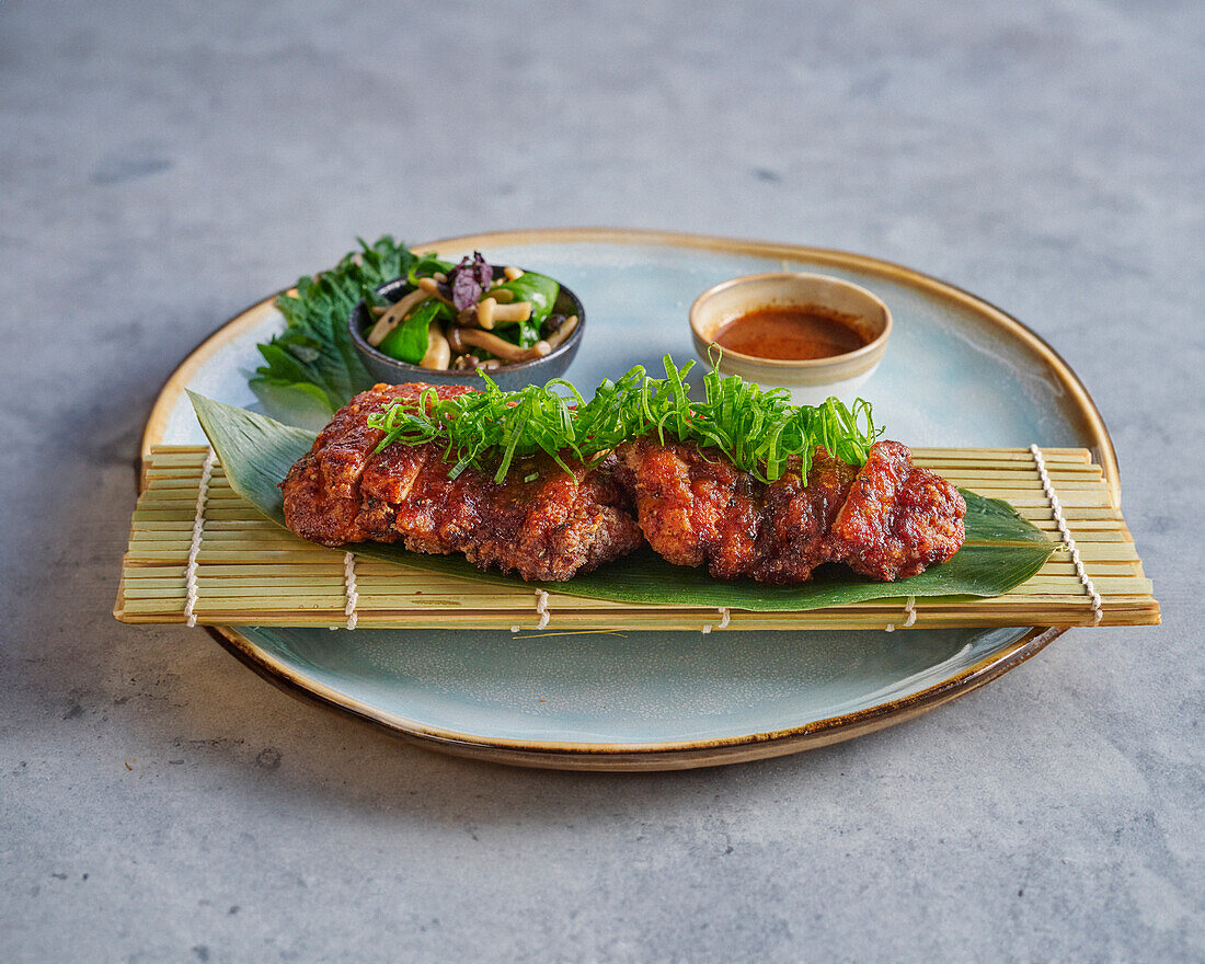 Crispy chicken breast with shichimi crust and lemon sauce