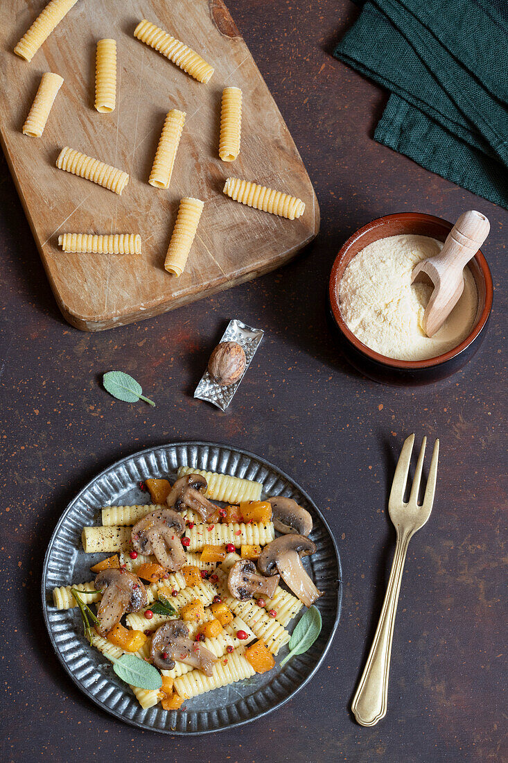 Egg macaroni with pumpkin and mushrooms