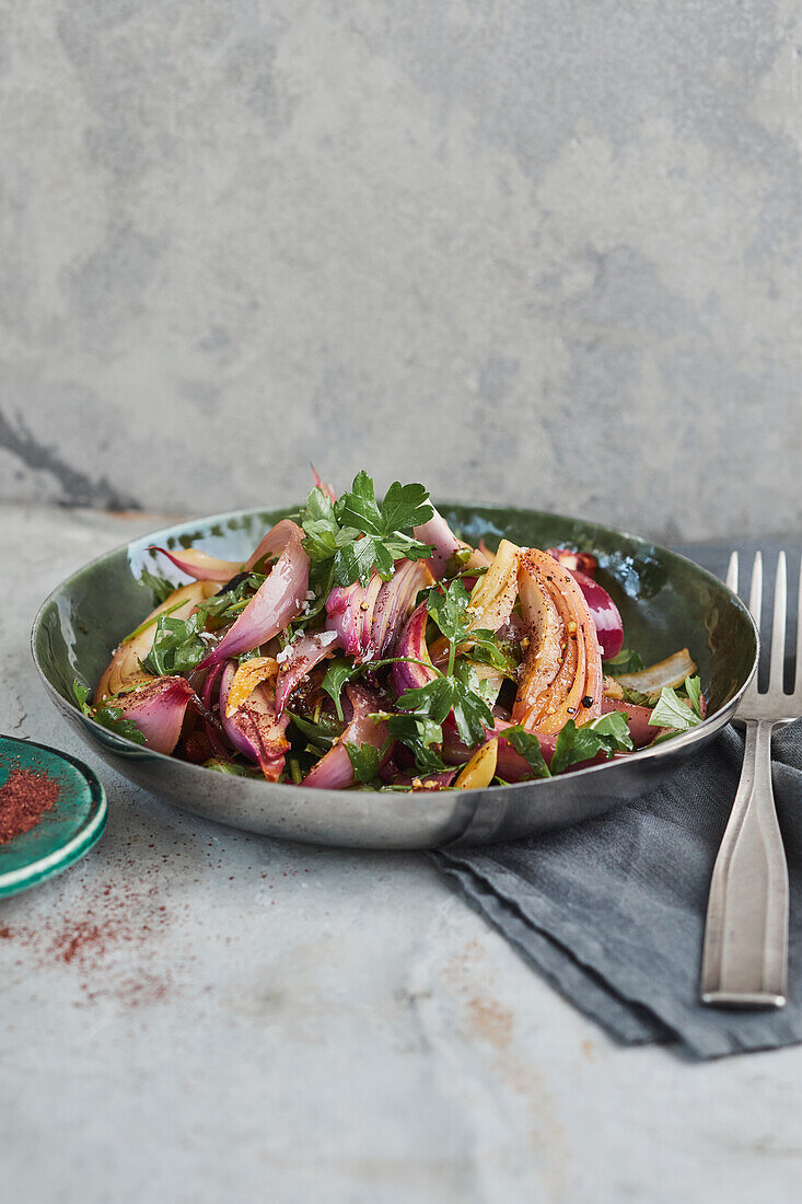 Onion and garlic salad with caramelised onions