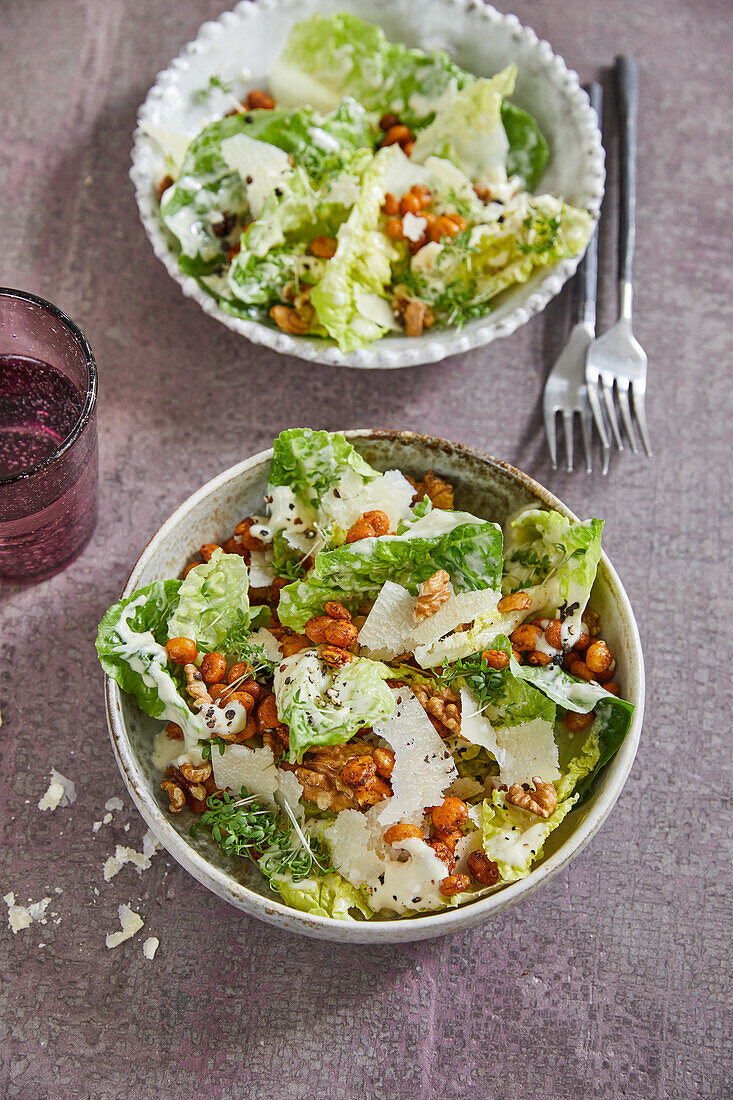 Caesar salad with roasted lupin seeds and walnuts
