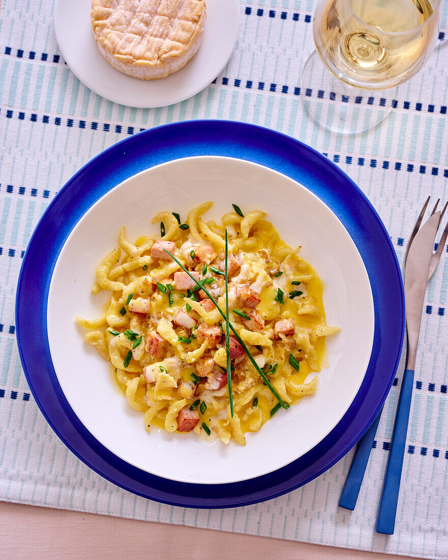 Spaetzle with Munster cheese and diced pork loin