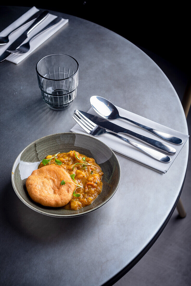 Aloo Kachori, Indian flatbread with vegetable sauce