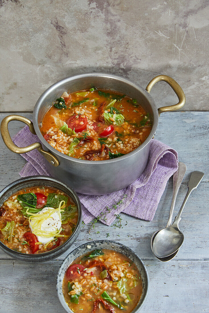 Savoy cabbage and cereal stew with sour cream