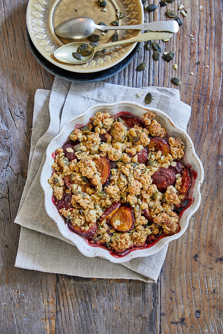 Plum and pumpkin seed crumble