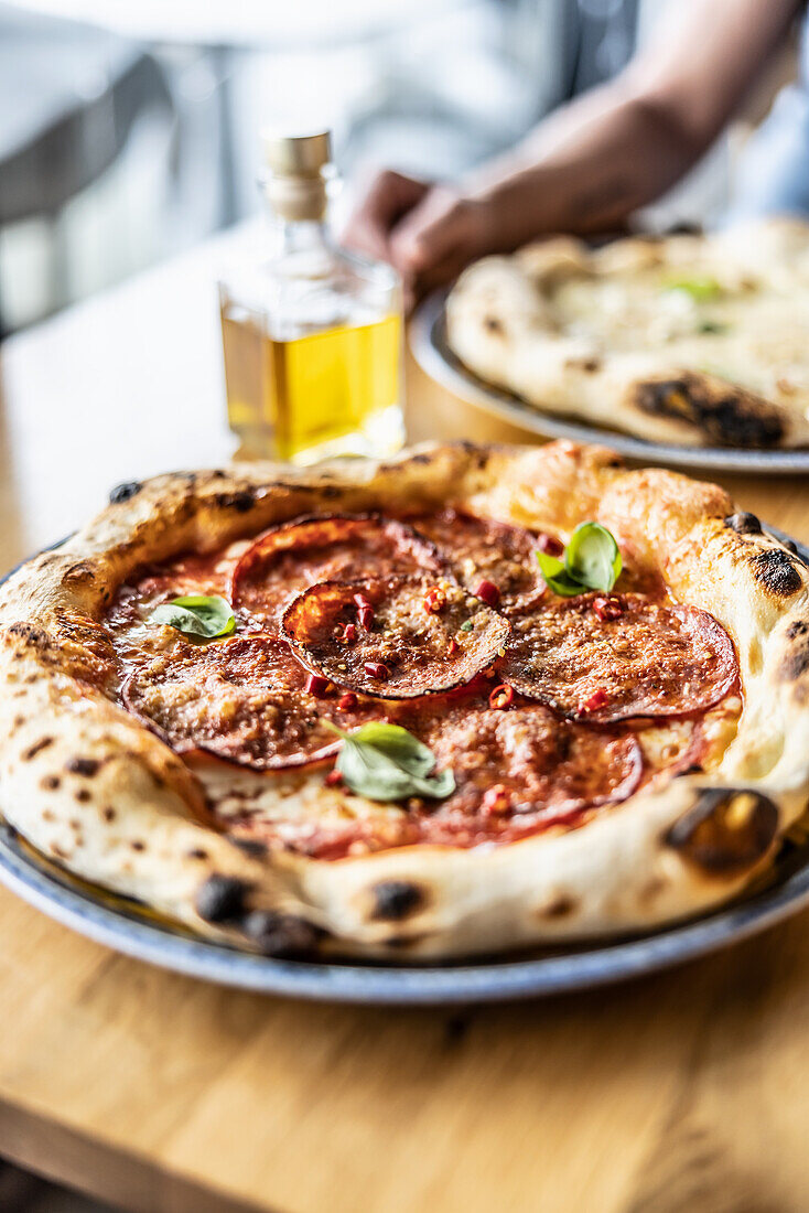 Spicy salami pizza on a plate