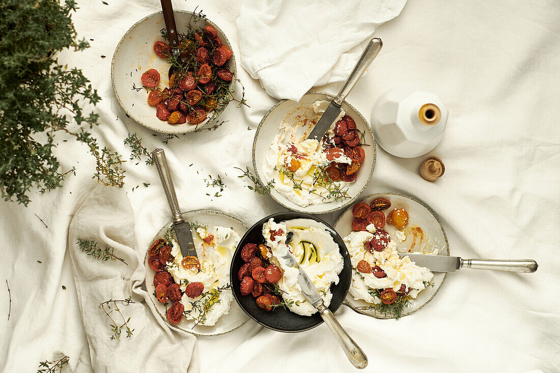 Labneh with semi-dried cherry tomatoes, oil and thyme
