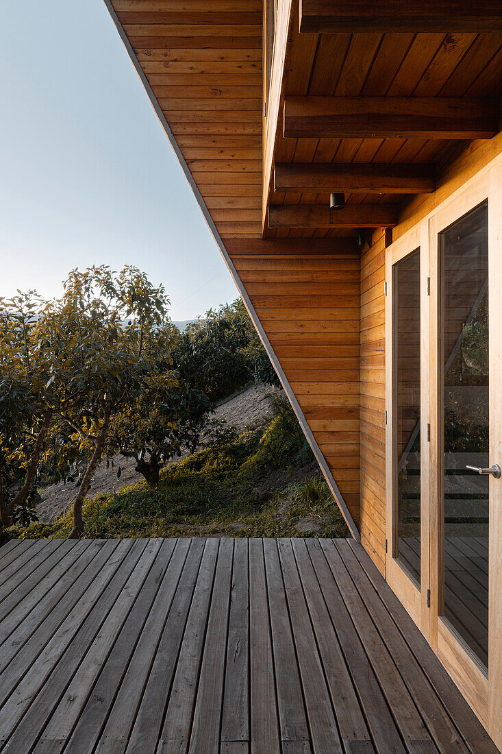 Wood-clad terrace with views of the hills, Casa Perucho, Ecuador