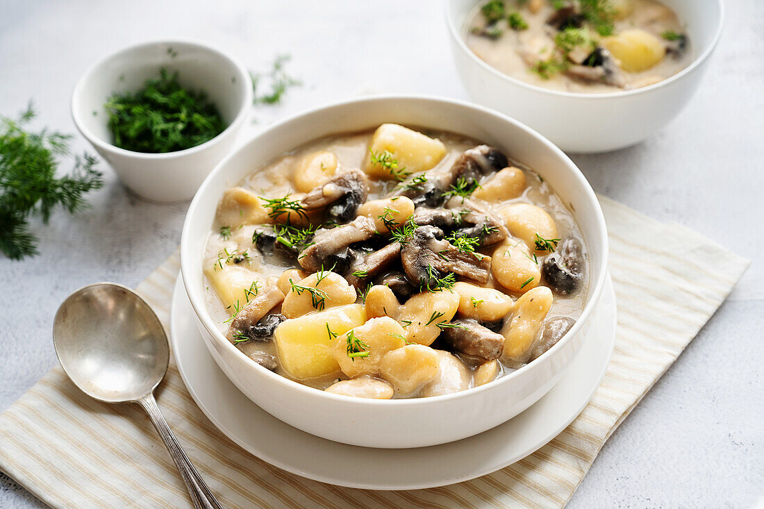 Vegan butter bean and potato stew with mushrooms