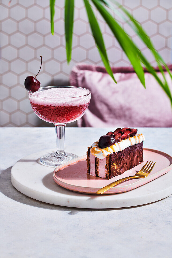 Chocolate cherry millefeuille served with cherry sour